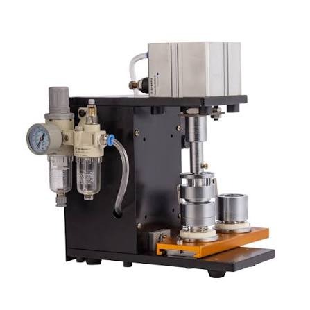 Induction Seals Punching Machine.
